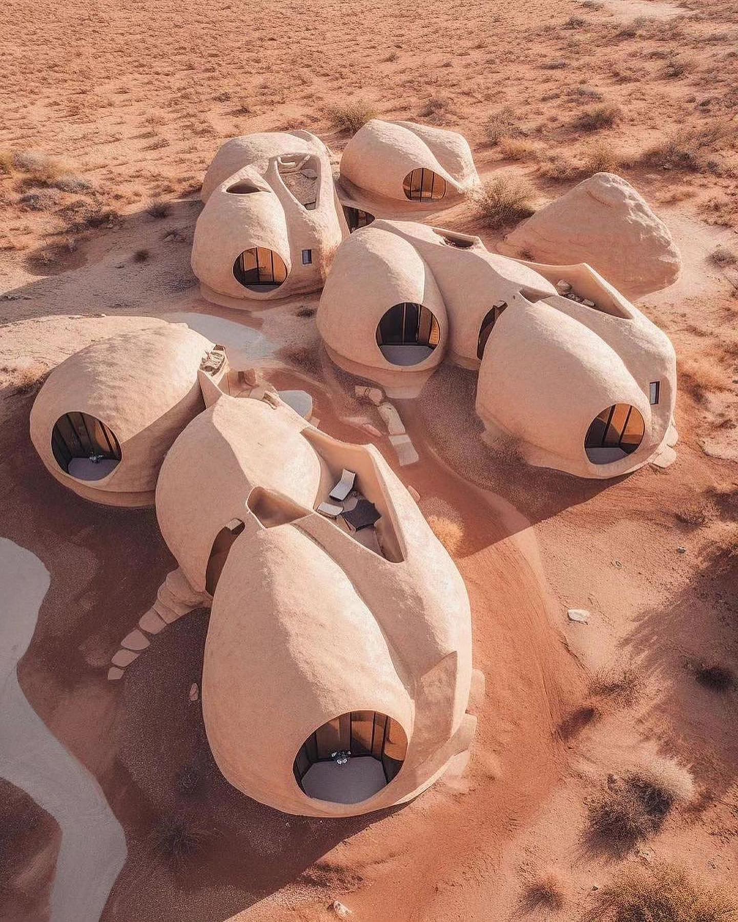 This meme is a humorous image of a fictional city called "Mos Eisley" from the movie "Star Wars." The text "Mos Eisley" is written in a font that resembles the movie's title. The image shows a city of buildings that look like giant eggs or rocks, with a large spaceport in the center.